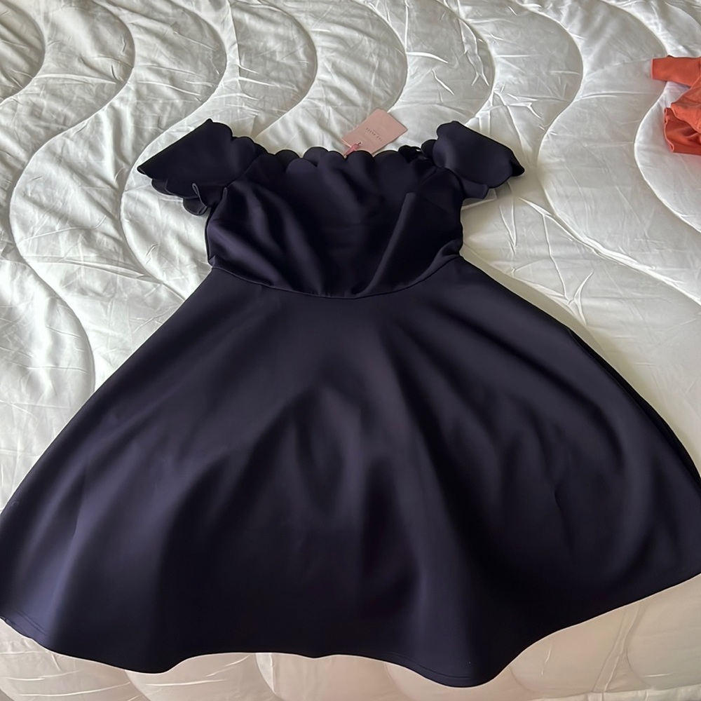 Navy blue fit and flare dress. Brand new with tags! Never worn!